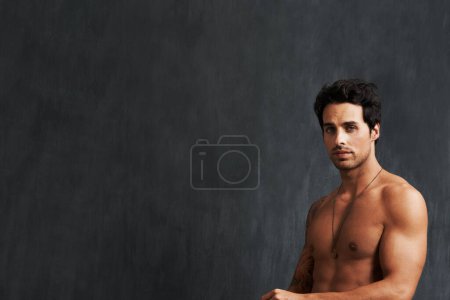 Photo for Portrait, fitness model and man shirtless, strong and muscular results from strength training, body building and workout. Bodybuilder, chalkboard mockup space and studio person on black background. - Royalty Free Image