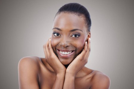 Photo for Skincare, mockup or hands on face of black woman in studio for wellness or glowing skin on grey background. Natural, beauty or portrait of female model happy with dermatology, shine or cosmetics. - Royalty Free Image