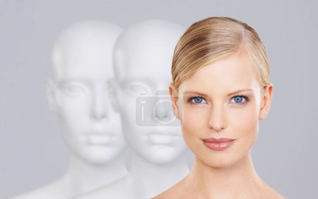 Photo for Woman, mannequins and face for identity, beauty and individuality on studio background. Person, skincare and dummy with portrait for creativity and cosmetics or unique ideas for satisfaction and skin. - Royalty Free Image