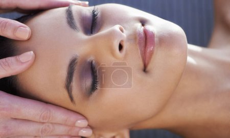Photo for Sleeping, head massage or hands with woman in hotel for wellness, treatment or hospitality in spa. Peace, smile or salon with calm person, client or masseuse on holiday vacation for beauty therapy. - Royalty Free Image