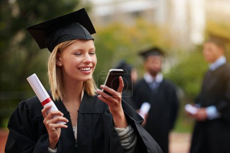 Photo for Graduation, certificate and phone with student woman outdoor on campus for university or college event. Mobile, communication and smile with young graduate at school for education or scholarship. - Royalty Free Image