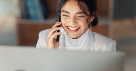 Photo for Business woman, computer and phone call in night, office and networking for deal, lead and smile for negotiation. Entrepreneur, smartphone and pc with happy conversation, thinking and dark workplace. - Royalty Free Image