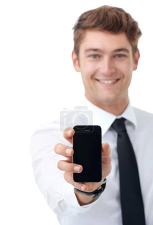 Photo for Businessman, portrait and presentation of phone in studio with smile in backdrop of white background. Man, excited and showing app for company with mobile screen for technology in professional work. - Royalty Free Image
