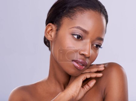 Photo for Face of black woman, natural beauty or thinking of makeup, cosmetics or healthy skin in studio. Dermatology, wellness ideas or African girl model with glow or skincare results on purple background. - Royalty Free Image