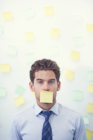 Photo for Man, portrait and sticky note for business stress as schedule reminder for meeting list, deadline or brainstorming. Male person, employee and paper or New York corporate or memo, anxiety or burnout. - Royalty Free Image