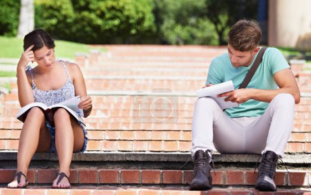 Photo for Studying, stress and students on steps at university with books for learning, knowledge and reading. Education, anxiety and man and woman worry with textbook for test, exam preparation and college. - Royalty Free Image