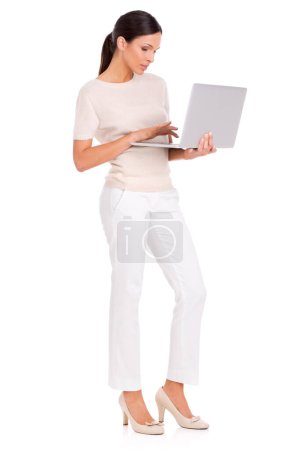 Photo for Business woman, laptop and planning in studio, networking and internet for research on white background. Female person, full body and online for social media, email and website for opportunity. - Royalty Free Image
