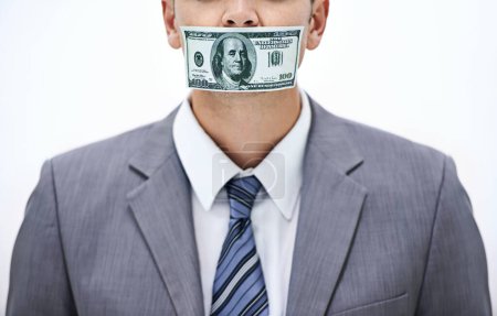 Photo for Business man, money and mouth for silence, bribe or corruption with suit in studio by white background. Person, cash and quiet for corporate crime with fraud, finance or illegal payment at job in USA. - Royalty Free Image