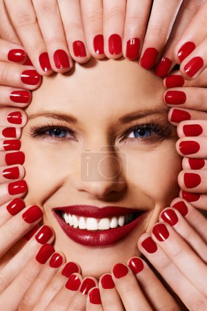 Photo for Beauty, cosmetics and portrait of woman with manicure, smile and lipstick with creative aesthetic. Luxury makeup, face and hands with red nail polish for self care, shine and happy model with product. - Royalty Free Image