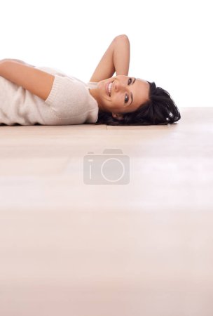 Photo for Woman, portrait and happiness on floor for relax with mock up space, weekend break and confidence in apartment. Person, lying down and face with smile in home on wooden flooring for fun and wellness. - Royalty Free Image
