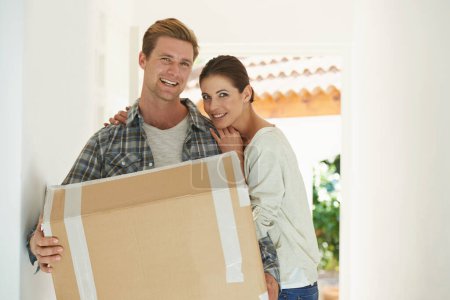 Photo for New house, portrait or happy couple with box for moving or excited for investment in real estate. Man, woman and proud homeowner with package by front door and smile face in living room for mortgage. - Royalty Free Image