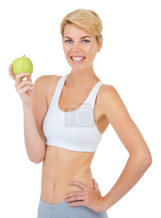 Photo for Woman, portrait and apple in studio for fitness, wellness or diet on white background, mockup or backdrop. Model, dietician or nutritionist with green fruit for cleanse, vitamins and workout. - Royalty Free Image