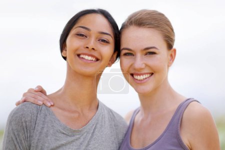 Photo for Happy woman, portrait and friends with hug for fitness, workout or outdoor exercise together in nature. Face of female person or team with smile for friendship or wellbeing in health and wellness. - Royalty Free Image