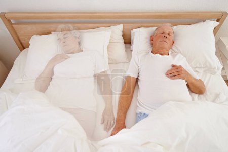 Photo for Sleeping, ghost and senior man in bed, depression and ghost of wife or spouse in bedroom. Elderly male person, mental health and dream at home, spirit and haunted by lonely or past memory in nap. - Royalty Free Image