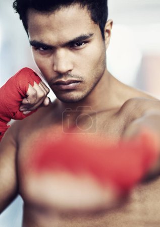 Photo for Gym, portrait and boxing fitness man with punch power, training or body performance, challenge or focus. Hands, mindset or guy fighter with fist wrap for sports battle, action or martial arts warrior. - Royalty Free Image