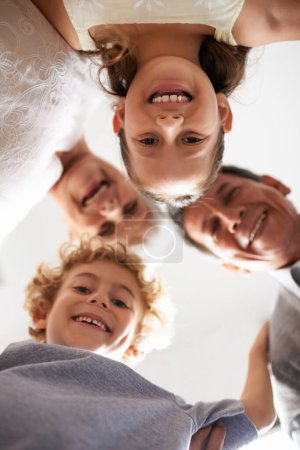 Photo for Grandparents, children and portrait smile from below huddle together for bonding connection, vacation or retirement. Elderly couple, kids and face with low angle for holiday care, happiness or love. - Royalty Free Image