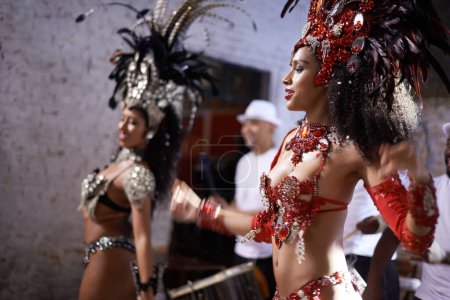Photo for Women, dancer and samba for carnival and music festival or night performance with costume and band. Group, dancing and drums for event, celebration and culture or history in Rio de Janeiro, Brazil. - Royalty Free Image