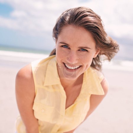 Photo for Happy woman, portrait and beach for summer holiday, weekend or tropical vacation in nature. Face of young female person with smile and yellow dress for fun travel or enjoying outdoor day by the ocean. - Royalty Free Image