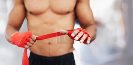 Photo for Bandage, wrap and hand of martial arts fighter for mma, safety and health for fitness workout. Strap, fingers and male person for protection to prepare for exercise, boxing and strength training. - Royalty Free Image