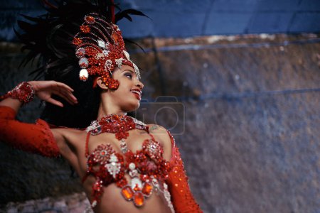 Samba, carnival or happy woman in costume for event, music culture or night celebration in Brazil. Outdoor, performance or proud dancer with smile at festival party, parade or show in Rio de Janeiro.