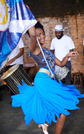 Show, drums or festival with a happy woman or dancer dancing in a carnival in Rio de Janeiro, Brazil. Performance, party or rhythm with musician, performer or artist banging to create beat in band.