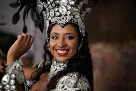 Photo for Portrait, woman or dancer to smile for carnival, costume and jewelry with sparkle, bling or diamante. Black female person, red lipstick and dancing with energy, action and movement in Rio de Janeiro. - Royalty Free Image
