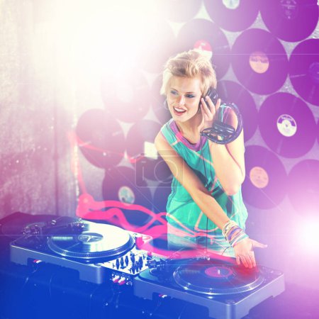 Photo for Woman dj, headphones and listen in night club for party with turntable, neon lights and lens flare. Gen z female person, smile or mixing decks at event with happy, techno and music in Berlin disco. - Royalty Free Image