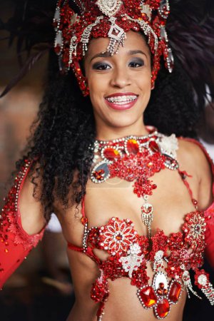 Photo for Dancer, carnival and girl in portrait with smile, pride or culture with glow for street performance in night. Person, fashion and woman at event, party or celebration with tradition in Rio de Janeiro. - Royalty Free Image