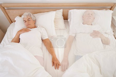 Photo for Sleeping, ghost and senior woman in bed, depression and mourning of husband or spouse in bedroom. Elderly female person, mental health and dream at home, spirit and haunted by lonely or past memory. - Royalty Free Image