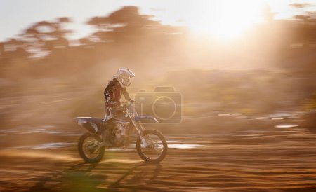 Photo for Motion blur, race and man on off road motorbike with adventure, adrenaline and speed in competition, Extreme sport, sunset and athlete on dirt bike for challenge, power or danger on action course. - Royalty Free Image