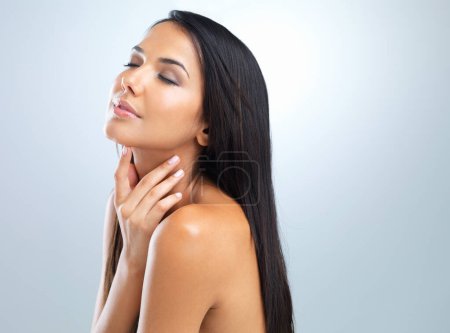 Photo for Wellness, shine and woman with dermatology, beauty and glow on grey studio background. Person, model and girl with skincare or healthy skin with cosmetics, facial or mockup space with self care. - Royalty Free Image