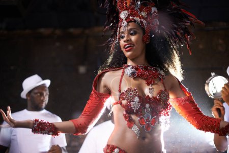Photo for Black woman, samba performance with band at night for carnival season celebration in Rio de janeiro with sequins costumes. Female person, happy and dancing at festival with unique fashion for culture. - Royalty Free Image