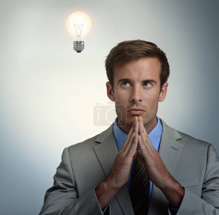 Photo for Thinking, idea or business man with lightbulb for vision in studio isolated on gray background overlay. Inspiration, dream or serious professional problem solving for solution, innovation or decision. - Royalty Free Image