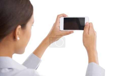 Photo for Mockup, woman and smartphone on studio, background and blank screen for businesswomen capturing image. Technology, networking and communication in social media, isolated and internet connection. - Royalty Free Image