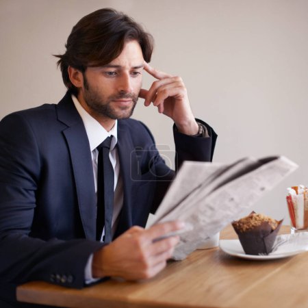Businessman, read and newspaper in coffee shop, food and relax on break from work. Male person, crypto investor and finance manager for firm, accounting and analysis stock prices and forex on lunch.