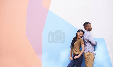 Photo for City, wall art and couple with mockup, love and funny with romance and bonding together. Happiness, man and woman with smile and outdoor with peace and vacation with date, cheerful and relationship. - Royalty Free Image