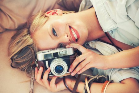 Photo for Portrait, woman and lens for retro, fashion and casual outfit for weekend getaway in Canada. Smile, camera and female person in stylish, trendy and clothing for analog, travel and photography. - Royalty Free Image