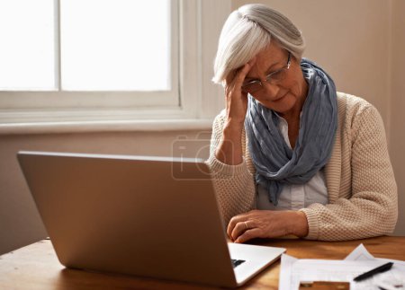 Photo for Senior woman, stress and laptop for finance in home, worry and paperwork for tax return or insurance. Elderly female person, frustrated and documents for retirement plan, fail and mistake in budget. - Royalty Free Image