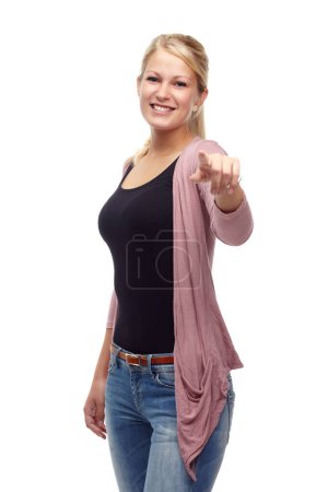 Photo for Fashion, woman and choice with smile in studio on white background, casual clothes and trendy outfit. Female person, pointing finger and happy with style for confidence, elegant and stylish jeans - Royalty Free Image