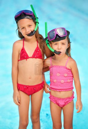 Photo for Snorkeling, goggles and portrait of kids at swimming pool, ready for adventure on vacation. Holiday, games or friends relax together with toys for fun, activity or children with safety gear for water. - Royalty Free Image