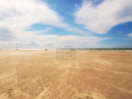 Photo for Sand, beach and blue sky with clouds in nature for travel, vacation or holiday in Cape town. Landscape, ocean and water by seashore on tropical island for scenic outdoor summer weekend trip - Royalty Free Image