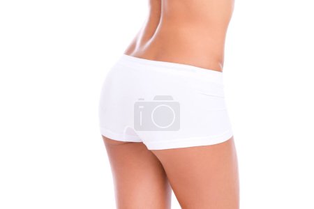 Téléchargez les photos : Studio, model and butt for fitness, exercise and white background with body. Person, cardio and training for health, wellness and exercising with underwear or nutrition for diet to lose weight. - en image libre de droit