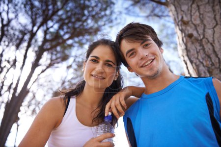 Photo for Fitness, couple and portrait in nature smile, healthy and together for wellness and cardio workout. Relax, forest walk or athlete exercise, park for sports with trees or low angle happy people hiking. - Royalty Free Image