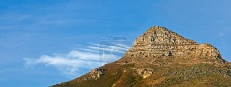 Photo for Mountain, blue sky and peak with natural landscape for travel location, outdoor adventure and environment. Banner, nature and landmark for peace, explore and holiday destination in Cape Town - Royalty Free Image