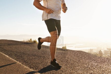 Photo for Legs, sneakers and running in street for fitness, cardio and health outdoor with fresh air and training for marathon. Sports, exercise and athlete person in city for workout, wellness and endurance. - Royalty Free Image