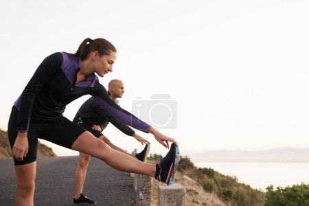 Photo for Mountain, stretching and woman with man for fitness, workout coach or help for healthy body. Exercise, wellness and girl runner with personal trainer in muscle warm up for outdoor morning training - Royalty Free Image
