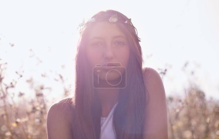 Photo for Woman, portrait and hipster with headband in wheat field or nature for outdoor summer or sunshine. Face of young female person, teenager or brunette in relax for season with lens flare in countryside. - Royalty Free Image
