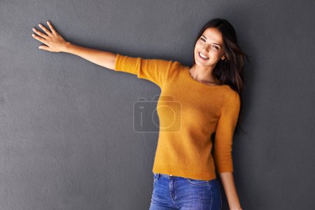 Photo for Happy, portrait and woman with hand on studio space for announcement, offer or news info on black background. Mockup, face and female model show deal announcement, review, feedback or deal promotion. - Royalty Free Image