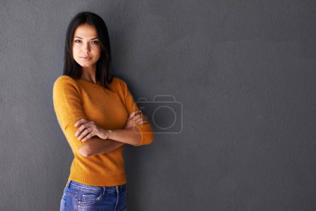 Photo for Portrait, mockup and face of lady in fashion with confidence, clothes and marketing space isolated on gray background. Female person, woman and model for outfit, stylish and fashionable in studio. - Royalty Free Image
