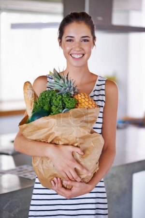Photo for Home, smile or portrait of woman with groceries on promotion, sale or discounts deal on nutrition. Happy, delivery offer or female person buying healthy food for cooking organic fruits or diet choice. - Royalty Free Image